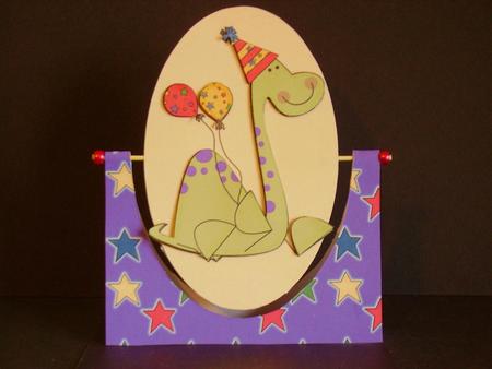 Green and Purple Spotted Dinosaur Spinner by Betty Aldred