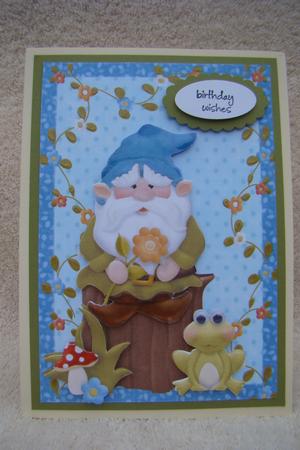 Lovely Gnome Thinking on a Log by Beverly Carmichael
