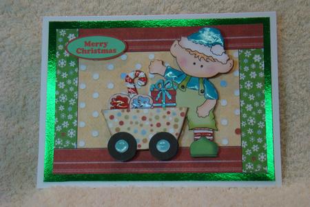 Santas Little Elf with Lots of Presents by Beverly Carmichael