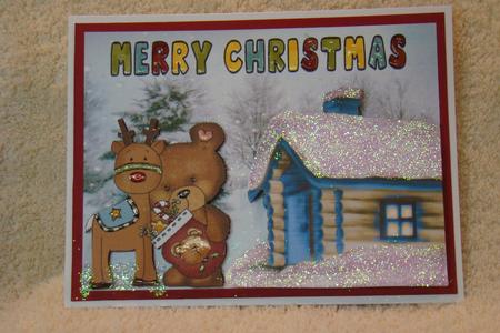 Teddy with Reindeer in the Snow with Cottage by Beverly Carmichael