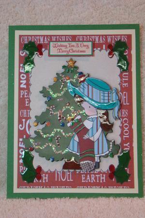 Little Girl in Bonnet Dressing the Christmas Tree by Beverly Carmichael