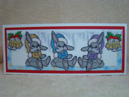 Little Grey Bunnies in Santa Hats in Snowflake Dl by Beverly Carmichael