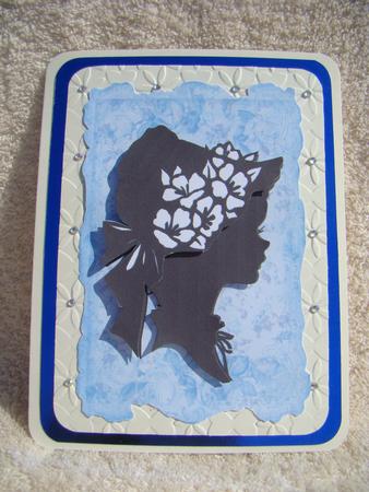 Vintage Silhouette Lady on Blue Floral Frame by Beverly Carmichael