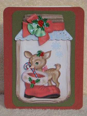 Deer with Santa Boot in Jar with Bells and Bow by Beverly Carmichael