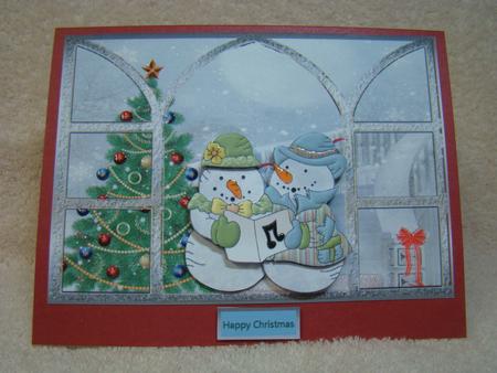 View Through the Window Snow People Sing by Beverly Carmichael