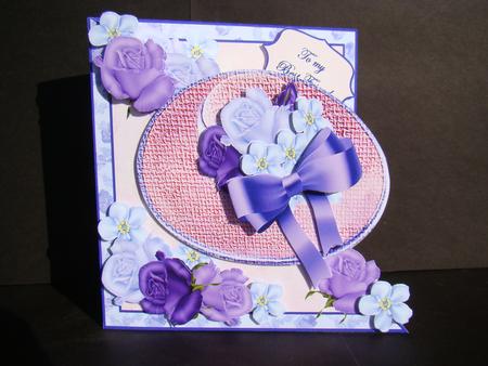 Diagonal Fold - Pink Hat with Blue Roses by Beverly Carmichael