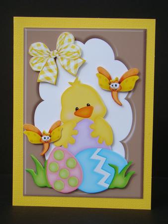 Little Chick with Easter Eggs in Chocolate Frame by Beverly Carmichael