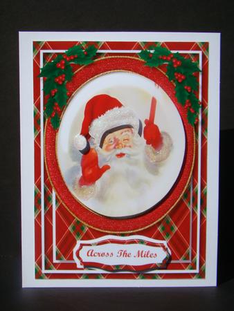 Jolly Santa in a Red Glitter Frame  by Beverly Carmichael
