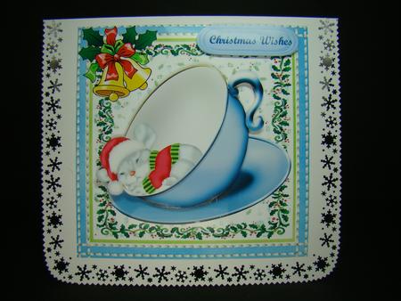 Little Mouse Asleep in a Blue Teacup by Beverly Carmichael