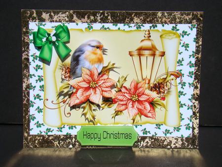 Robin with Poinsettias, on a Scroll with Holly by Beverly Carmichael