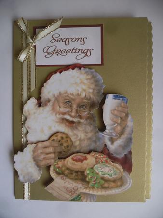 Santa Enjoys His Milk and Cookies by Beverly Smith