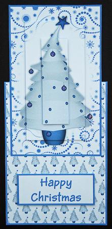 Contempory Christmas Tree with Blue Baubles by Carol Bath 