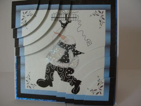 Snowman Carrying Gift by carol croft
