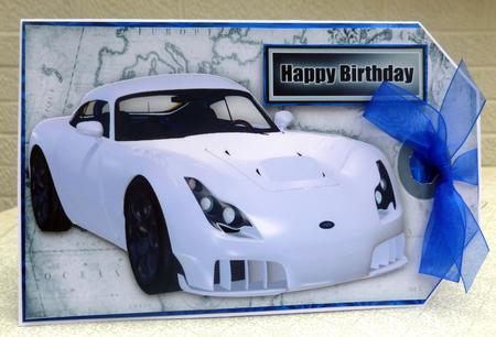White Sports Car on a Tag with Map by CAROL LODGE