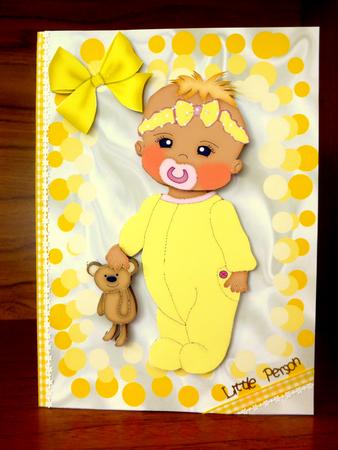 Baby Girl in Yellow Bubble Frame with Dummy by CAROL LODGE