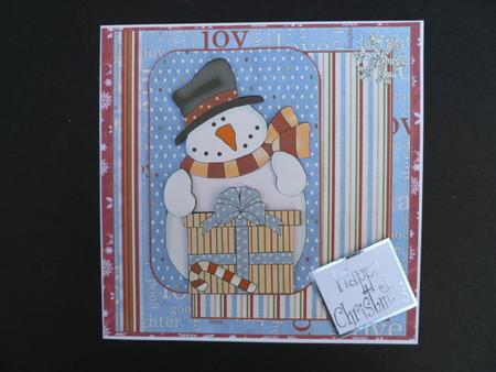 Snowman with Gift by Carol Sear
