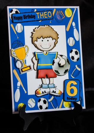 Soccer Boy Wins the Cup in Sports Frame A4 by Carole Keeble