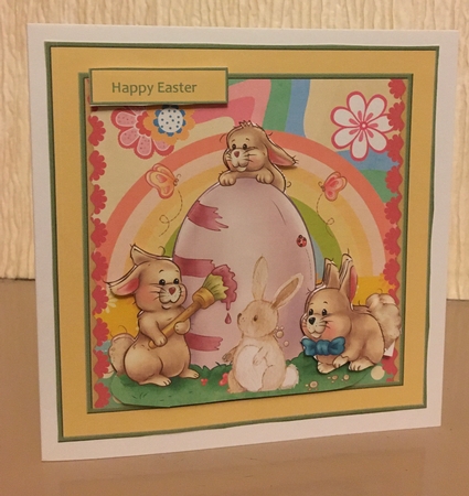 Easter bunnies painting the egg 6x6 by Carole McGregor