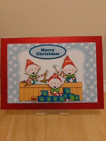 Santas Christmas Elves in the Workshop by Caroline Curran