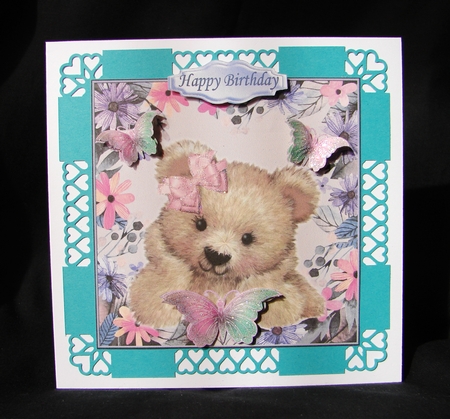 Lovely smile fuzzy bear in flower frame with butterflies 8x8 by Carolyn Norris