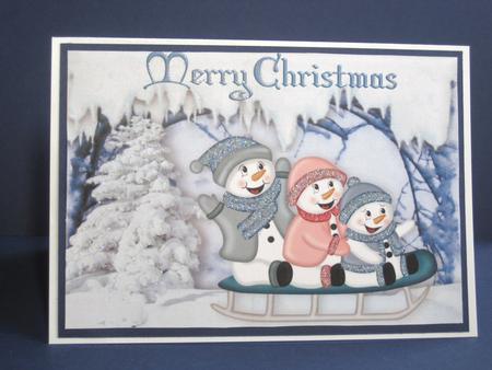Fun in the Snow on a Sledge A4 by Carolyn Norris