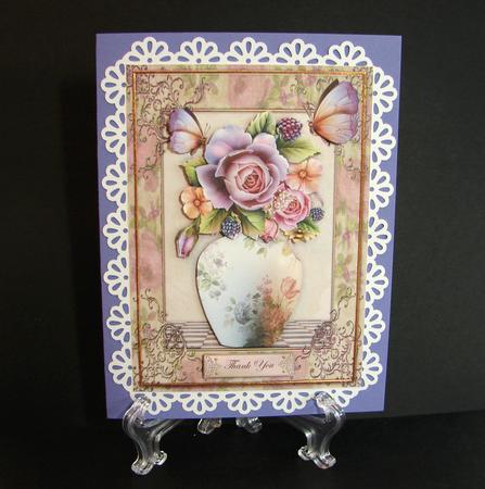 Vase of Roses by Carolyn Norris