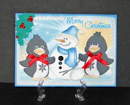 The Snowman and Penqiuns by Carolyn Norris