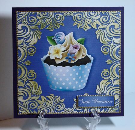 Golden Swirl Floral Cupcake by Carolyn Norris