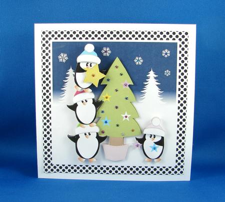 Tree Decorating Penguin Topper by Carolyn Norris