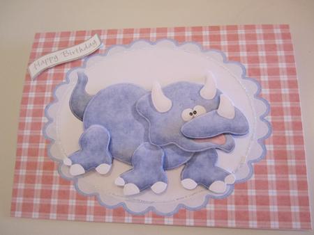 Cute Dark Blue Dinosaur in Dark Blue Frame by Catherine Lucy Lines