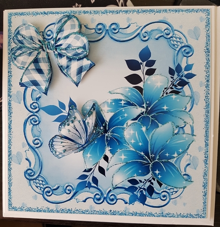 pretty blue butterflies in scroll frame with flowers 8x8 by Catherine Noon