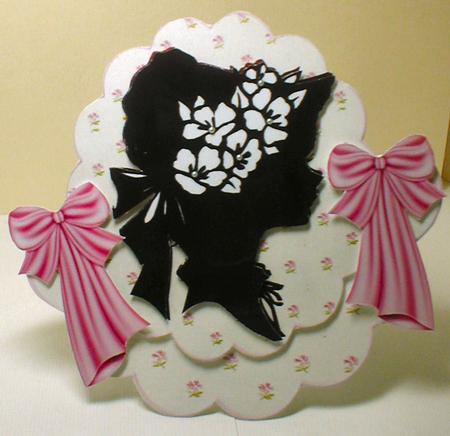 Vintage Sillouette Lady with Bows on Floral Scalloped Rocker by Celia Clare