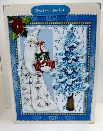 Ovely Santa with Presents and Blue Tree by Celia Clare