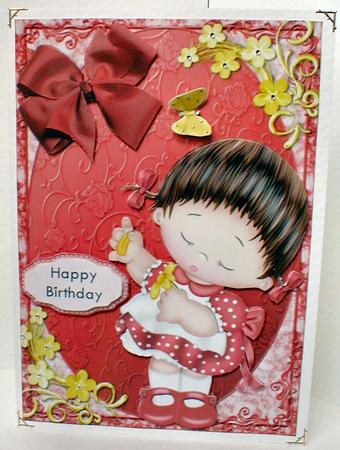 Lovely Little Brunette Girl in Red Polka Dot Dress by Celia Clare