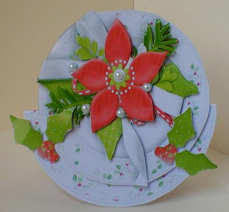 Christmas Flowers with Holly on Rocker Card by Celia Clare