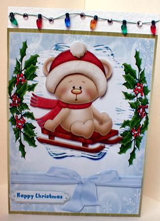 Lovely Sledging Snowbear in Red  by Celia Clare
