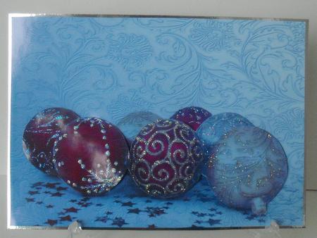 Christmas Baubles on Ice Blue Background by Michelle Sharpe