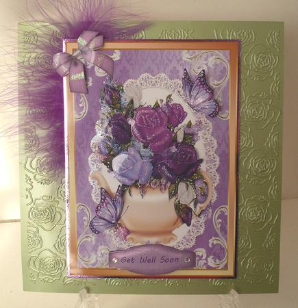 Lovely Purple Roses in a Teapot by Michelle Sharpe