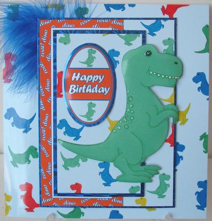 Dinosaurs on a Blue Background Backing Paper by Michelle Sharpe