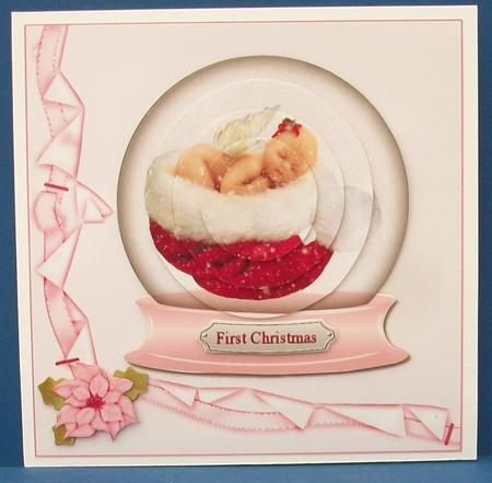 Baby Girls First Christmas Snowglobe by Cheryl French