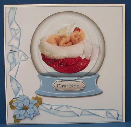 Baby Boy's First Christmas Snowglobe by Cheryl French