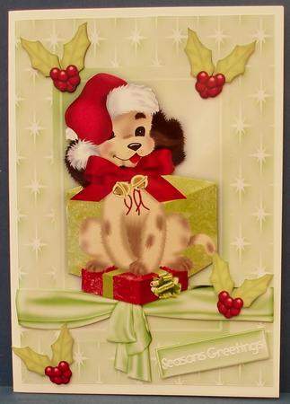 Christmas Puppy with Santa Hat On by Cheryl French