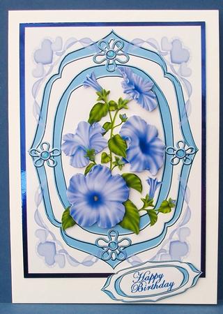 Petunias on an Oval Blue Frame by Cheryl French