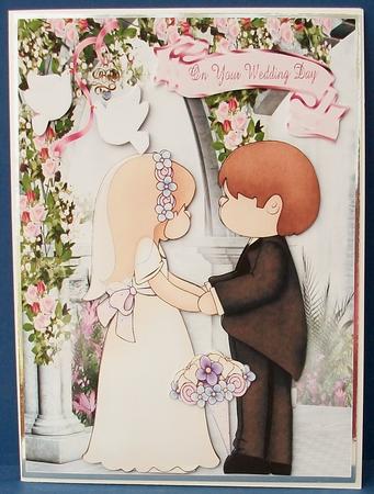 Lovely Wedding Couple with Doves in a Rose Garden by Cheryl French