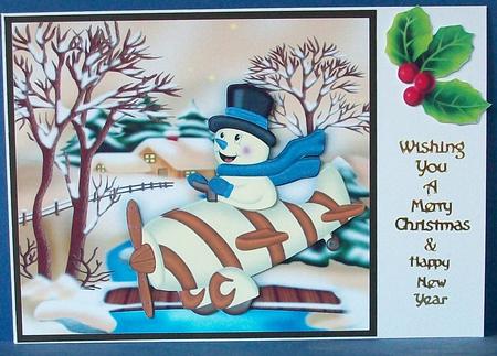 Snowman in a Plane with Bridge in the Snow by Cheryl French