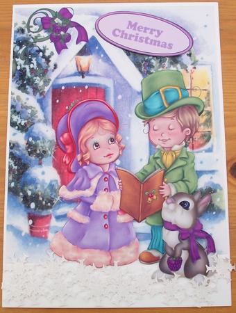 Carol Singers with Little Rabbit and Cottage by Cheryl French