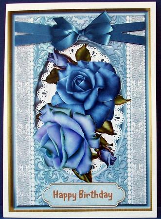Lovely Blue Roses on a Oval Plaque by Cheryl French