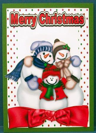 The Snowman Family, with Big Red Bow by Cheryl French