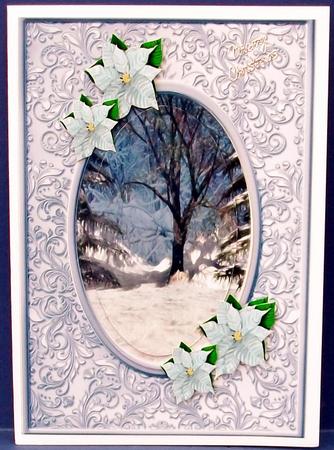 Christmas Scene with Blue Poinsettias Oval Pyramids by Cheryl French