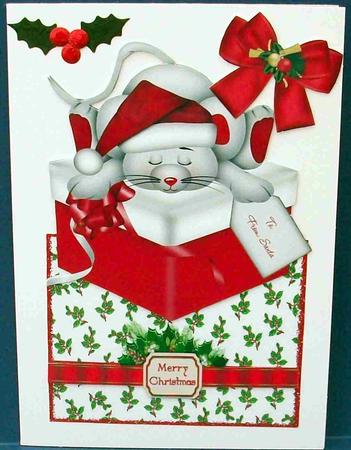 Sleepy Mouse in Santa Hat, on a Present, Over the Edge by Cheryl French